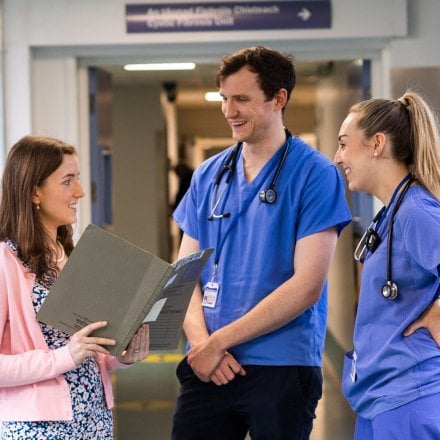 Doctors talking to each other in the hospital